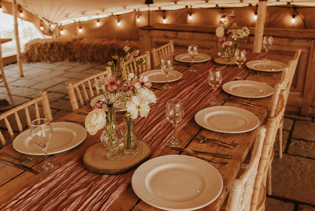 Dining in the tipi-style marquee at Jenners Barn